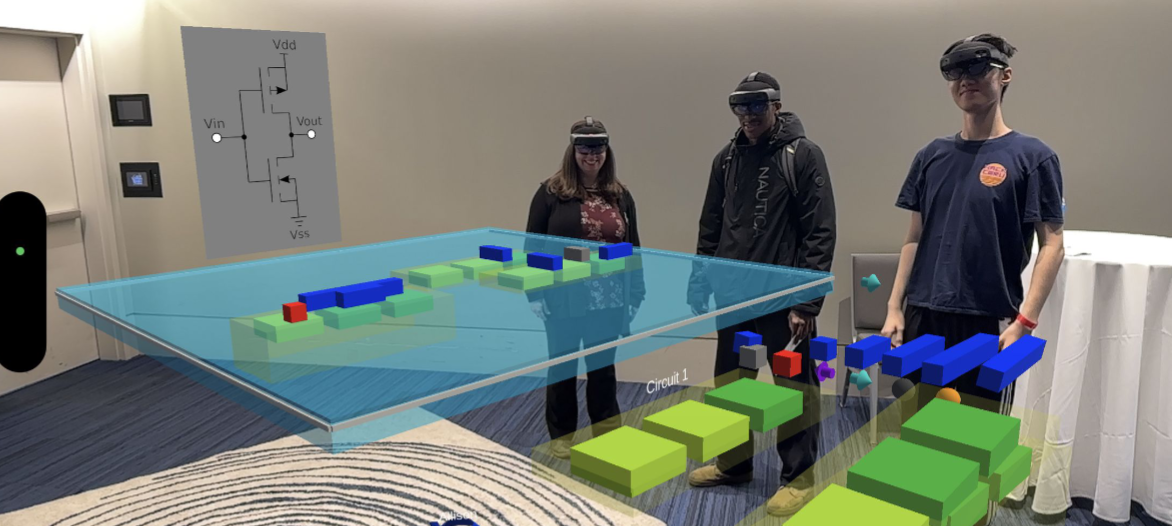 A holographic silicon wafer floating in space with semiconductor layers being assembled by a student's hands. Component repository panels visible alongside.